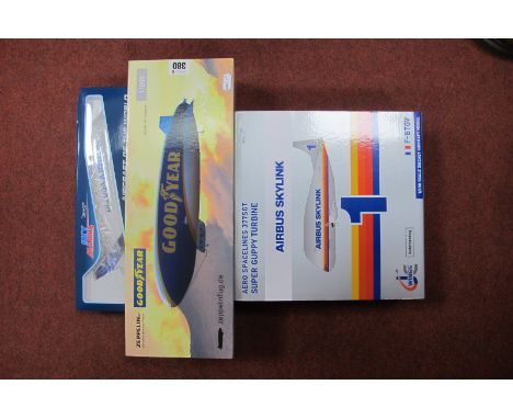 Three Boxed Diecast and Plastic Model Aircraft, comprising of Herpa 1:200 # 571777  Zeppelin NT 'Goopdyear', Iwings Aviation 