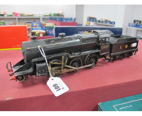 Bassett-Lowke 'O' Gauge/7mm 2-6-0 Clockwork Steam Locomotive plus Six Wheel Tender, L.M.S black R/No 2867, playworn, requires