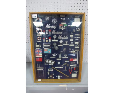 Mersey Marine Models - A Wooden Framed and Glazed Display Cabinet, exhibiting a collection of model ship accessories/componen