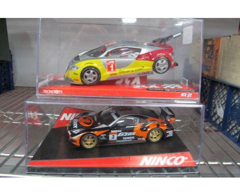 Two 1:32nd Scale Slot Cars, comprising of SCX Technitoys #61840 Seat Cupra GT "Domo" (damage to rear wing), Ninco #50427 Niss