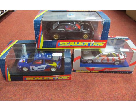 Three Scalextric 1:32nd Scale Slot cars, #C.2007 Renault Megane Diac, #C.2002 Audi A4 Quattro, all cased.