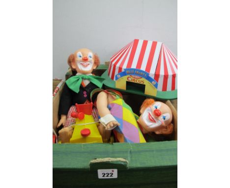 A Circa Early 1970's Palitoy Tumbling Circo Clown and His Car, yellow clowns car with red fittings battery operated untested.