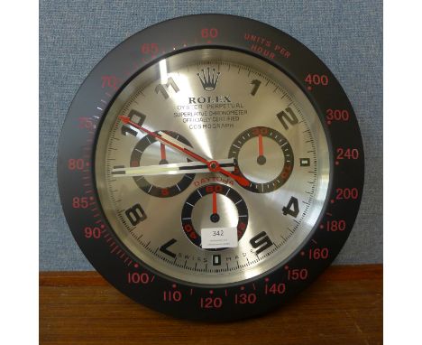 A Rolex style dealer's display wall clock 