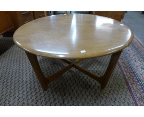 An  Ercol Blonde ash circular coffee table 