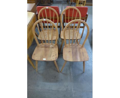 A set of four Ercol elm and beech Windsor chairs 