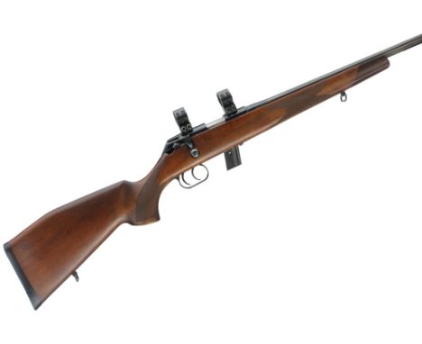 Rubber butt pad, raised cheek piece. Chequered pistol grip with palm swell and fore-end, rosewood end cap. Double set trigger