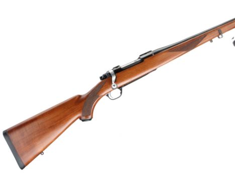 Bead mounted foresight, Ruger dovetail rail, blued barrel, main body and cocking piece. Beech stock with crisp chequering to 