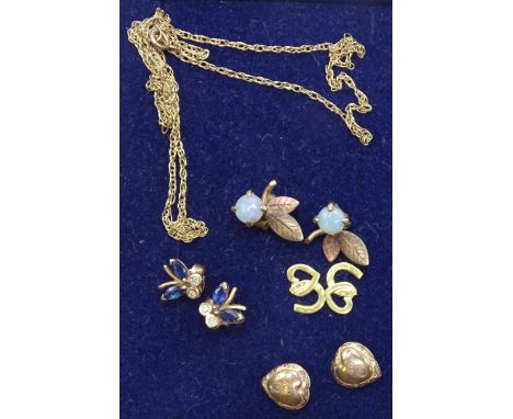 A pair of 9ct gold sapphire and diamond ear studs in the form of butterflies, another pair set opals, two other 9ct gold pair