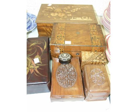 A wooden writing box with inlaid decorated lid and fitted interior, 34cm wide, a wooden playing card box and cover, a lacquer