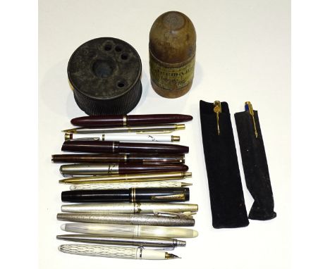 Four various Sheaffer fountain pens, other fountain and ballpoint pens, a wooden Waterman's Ideal Ink holder and a ceramic pe