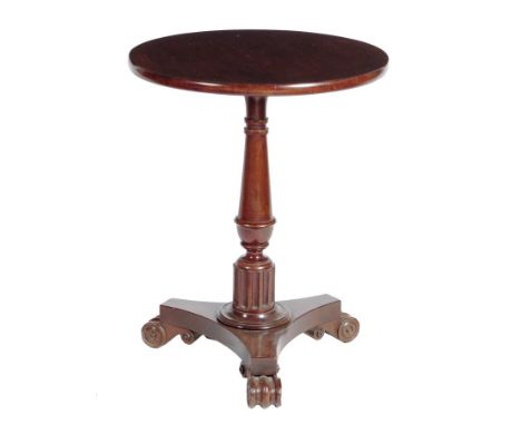 A mahogany occasional table, inlaid with ebonized stringing on scroll feet, early 19th century and later, adapted from a pole