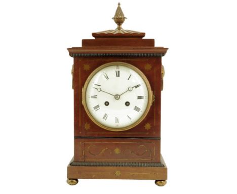 A French mahogany mantel clock, the striking movement stamped 'F. Martin, no. 316', numbered pendulum, in a Regency style bra