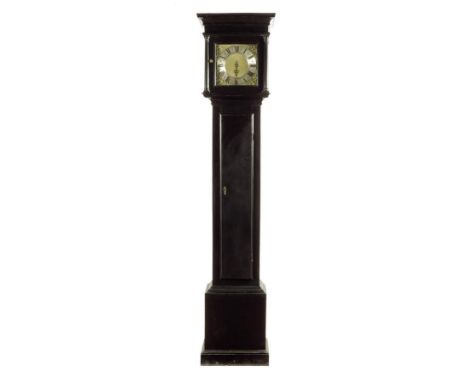 An ebonized longcase clock, the thirty hour birdcage movement striking on a bell, with a brass dial with a silvered chapter r