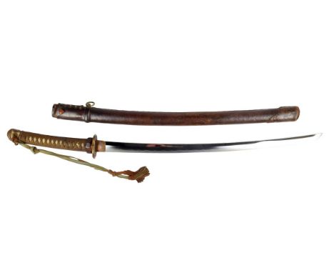 A Japanese WWII officer's katana, with an 85cm long blade, the tang signed and with mon hot stamp and and a Seki stamp, with 