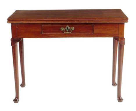 A George II mahogany card table, the fold-over top revealing a blue baize lined playing surface, with counter-wells and candl