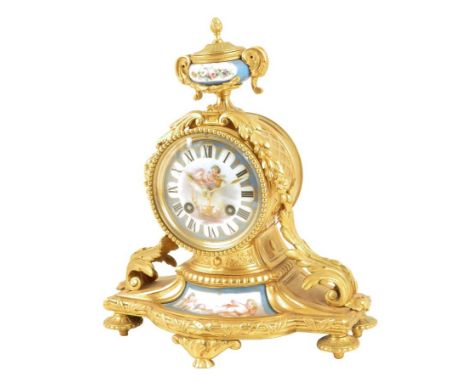 A French porcelain mounted ormolu mantel clock, the striking movement stamped 'G. Philippe, Palais Royal 66 & 67', the dial a