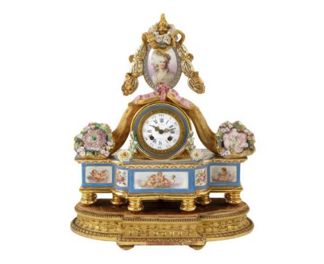 A French porcelain mantel clock, the white enamel dial signed 'Hry Marc a Paris', the drum striking movement stamped 'Hy. Mar
