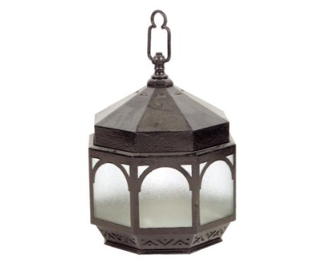 A black painted tole octagonal lantern, with frosted glass panels, 64.5cm high, 41.5cm wide.