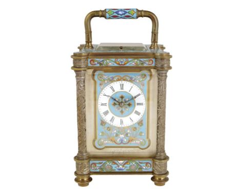 A French gilt brass and champleve enamel repeating carriage clock, the silvered platform lever escapement striking on a gong,