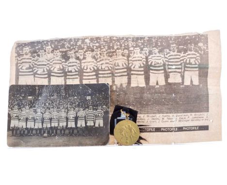 CELTIC EUROPEAN TOUR 1911, MEDAL AND PHOTOGRAPH,the unmarked medal presented to Andrew Donaldson, with two footballers to obv