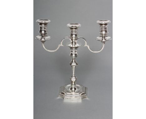 A GEORGE II STYLE TWO BRANCH THREE LIGHT SILVER CANDELABRUM, maker Barker Ellis & Co., Birmingham 1971, the spool sockets wit