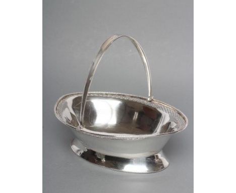 A SILVER BASKET, maker Levi & Salaman, Birmingham 1919, of eliptical form, the everted lozenge pierced border with cast and a