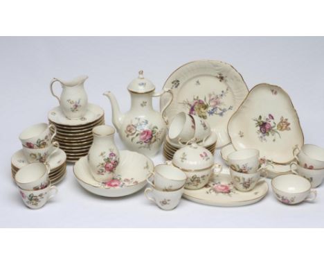 A ROYAL COPENHAGEN CREAM PORCELAIN SERVICE, mid 20th century, printed in colours with loose bouquets of flowers, comprising t