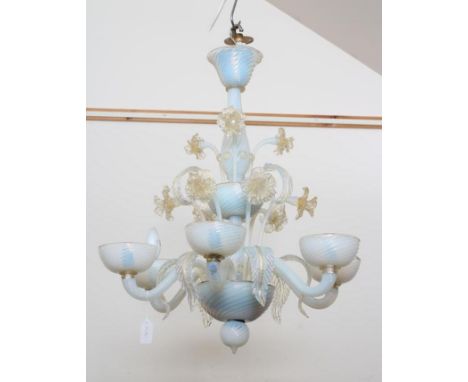 A VENETIAN SIX LIGHT CHANDELIER, 20th century, in Latticino blue and opaque glass, the baluster stem above a bowl issuing scr