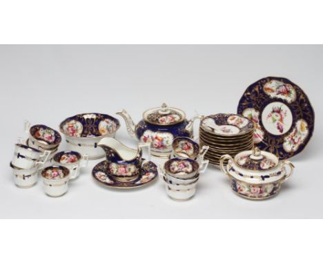 AN ENGLISH PORCELAIN FLUTED TEA SERVICE, c.1830, probably Daniel, painted in polychrome enamels with panels of summer flowers