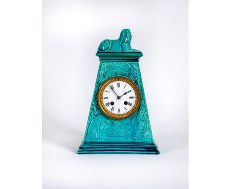 A BURMANTOFT'S FAIENCE TURQUOISE GLAZED AESTHETIC STYLE MANTEL CLOCK, early 20th century, of tapering oblong section surmount