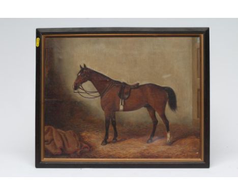 J. TURNER (19th Century), "Goliath", Portrait of a Bay in a Stable, oil on canvas, signed and dated 1888, inscribed to revers