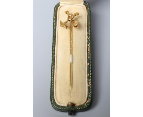 A VICTORIAN "GOLD RUSH" STICK PIN, with spade, pick axe, rope and nugget mount, unmarked, cased (Est. plus 21% premium inc. V