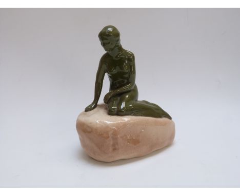 Carlsberg ceramic figure of a lady on a rock, White Horse whisky figure and a pewter plate 
