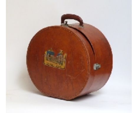 A vintage leather hat box with remains of label for a hotel in Den Haag, Holland 