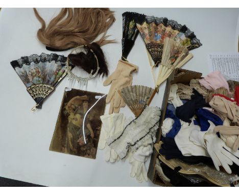 A large collection of vintage handbags, gloves, fans etc