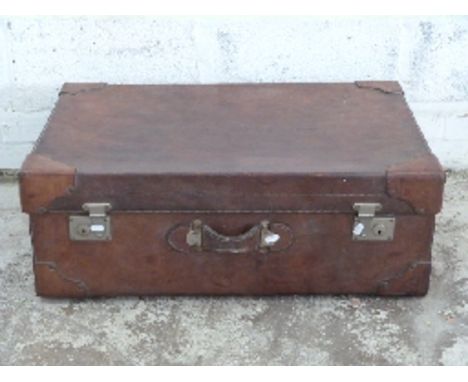 Large leather suitcase or trunk with corner protectors and lined interior, W68 x D50 x H28cm 
