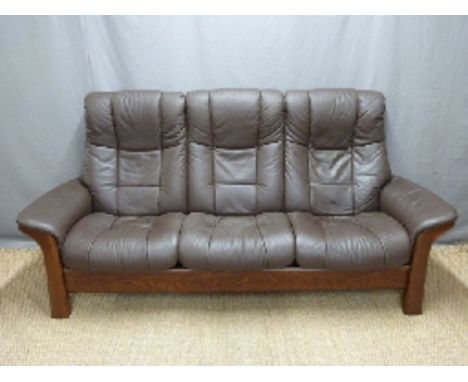 Stressless brown leather three seater sofa with individual reclining facility for all three seats, W212cm 