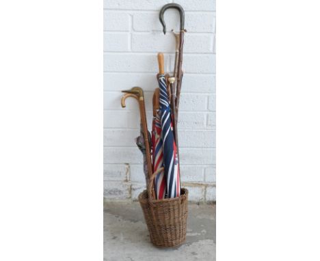 A collection of vintage stick/ umbrella 