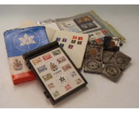 An album of first day covers, a Canada centenial commemorative stamp box, sundry tapes etc