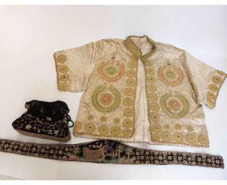 A Chinese or similar bolero jacket with gold thread embroidered decoration, a black velvet evening bag with gold beadwork and