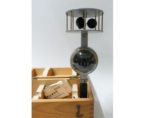 A hand anemometer by R Fuss, in original box