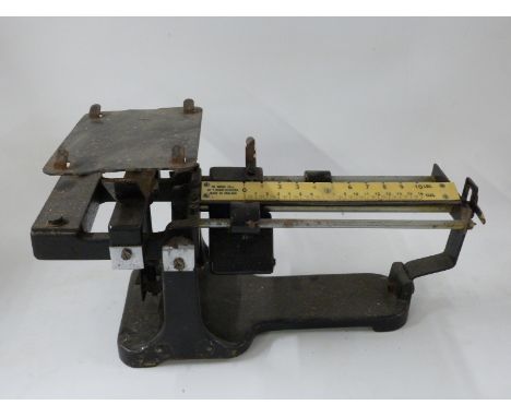 Cased county standard or similar scales and a set of cantilever scales with sliding weight  