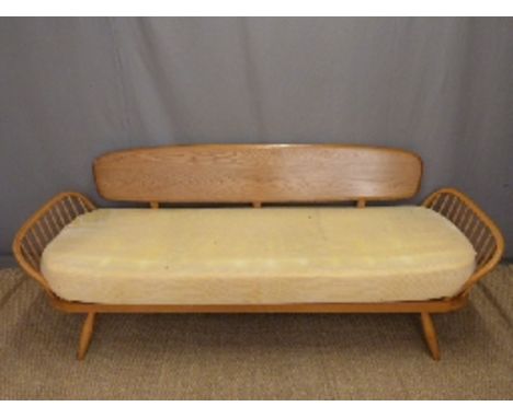 Retro Ercol light elm sofa or day bed raised on splayed tapering legs, W214 x D70 x H77cm