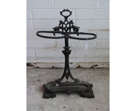 A cast iron stick/umbrella stand