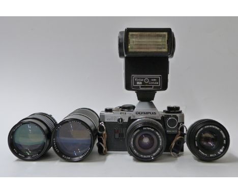 Olympus OMIO SLR camera with 1:3.5 f=28mm lens, Optomax 1:5.5 f=50mm lenses, bag etc 