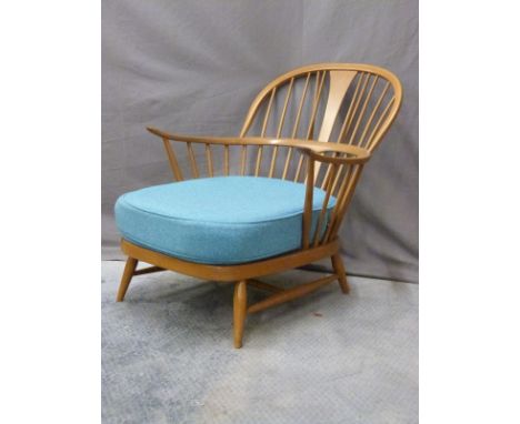 Ercol light elm easy chair with blue cushion