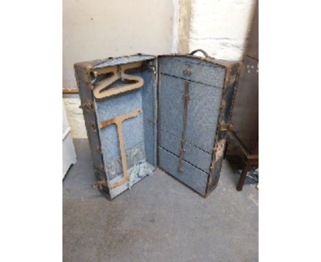 Ash bound metal steamer or travelling trunk with vintage Elder Dempster labels, W101 x D54 x H36cm