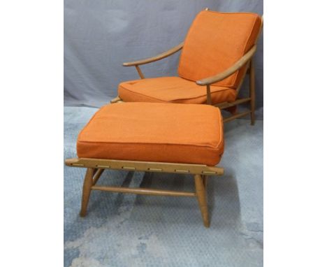 Ercol light elm low lounger chair 427-2 with matching footstool and original orange upholstered cushions