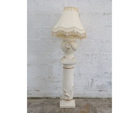 A faux carved stone plinth with lamp, H164cm