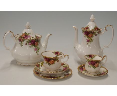 Royal Albert Old County Roses tea, coffee and dinnerware, approximately 60 pieces including a clock, boxed Royal Worcester Qu